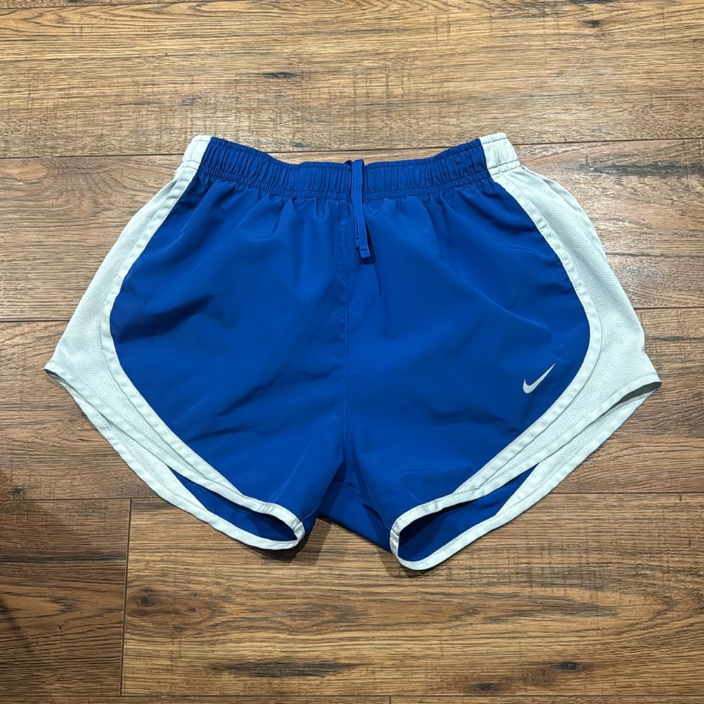 blue Nike shorts slightly bigger than small